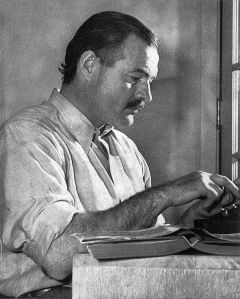 Ernest Hemingway adds the finishing touches to his flash fiction.